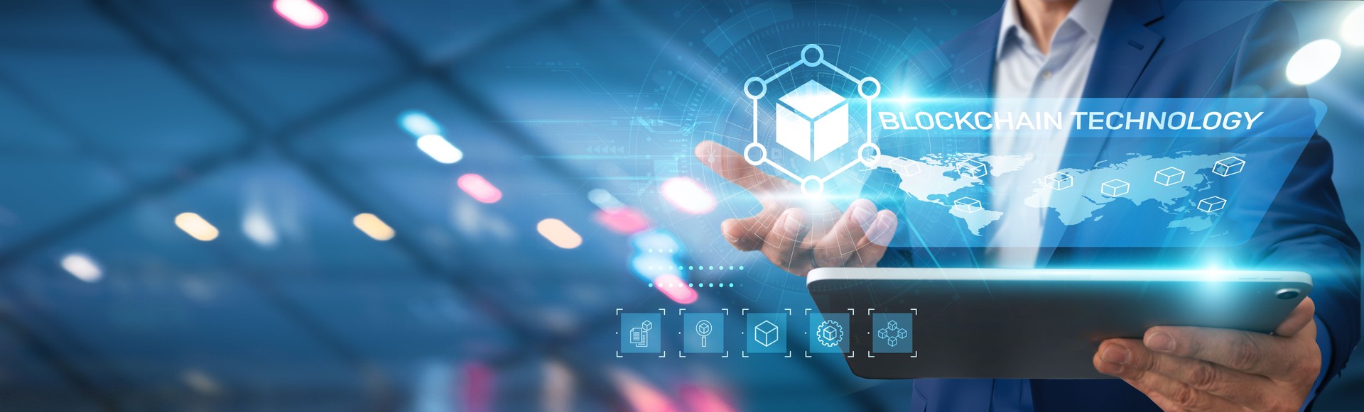 Businessman using tablet analyzing blockchain technology trends, market data, potential applications, financial transactions security, decentralized networks impact, smart contracts implementation.
